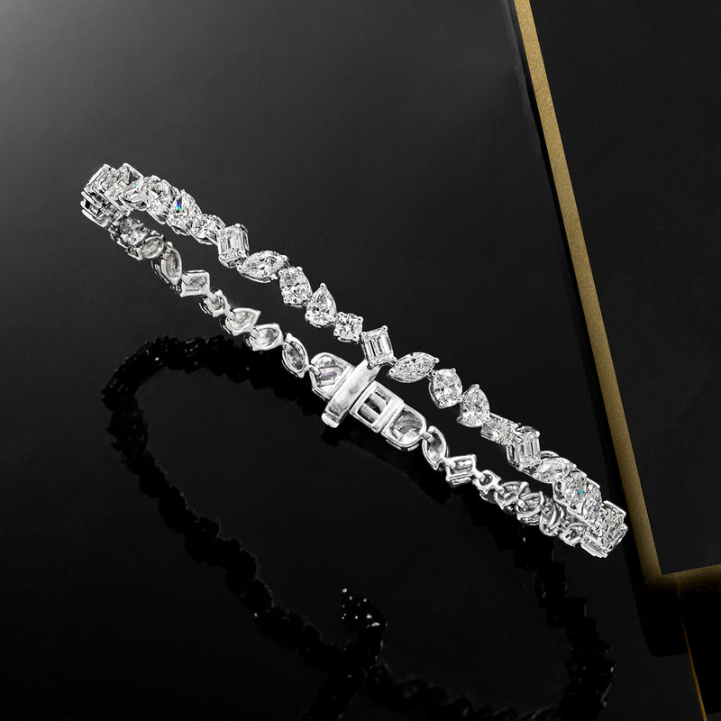 Multi-shaped diamond bracelet with white gold box clasp detail