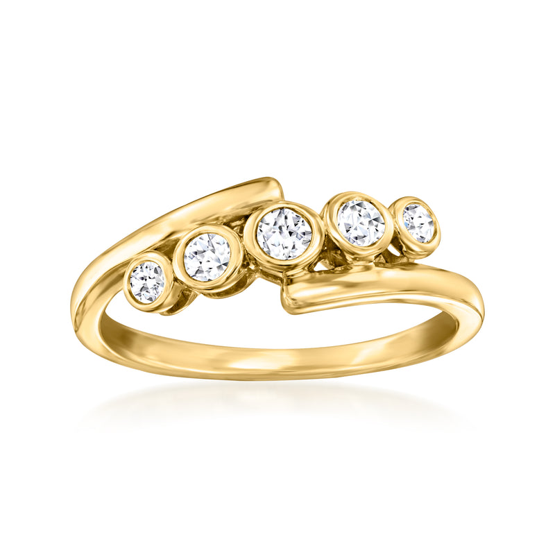 Yellow gold five-stone bezel-set diamond ring, three round stones on curved band