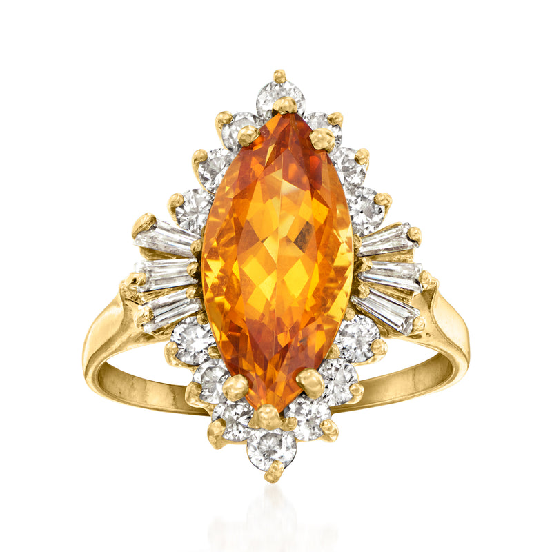 Vintage oval citrine and diamond halo ring in 14k yellow gold with prong settings