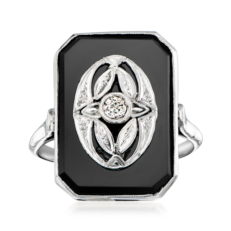 Vintage onyx ring in platinum with octagonal black stone and single diamond setting