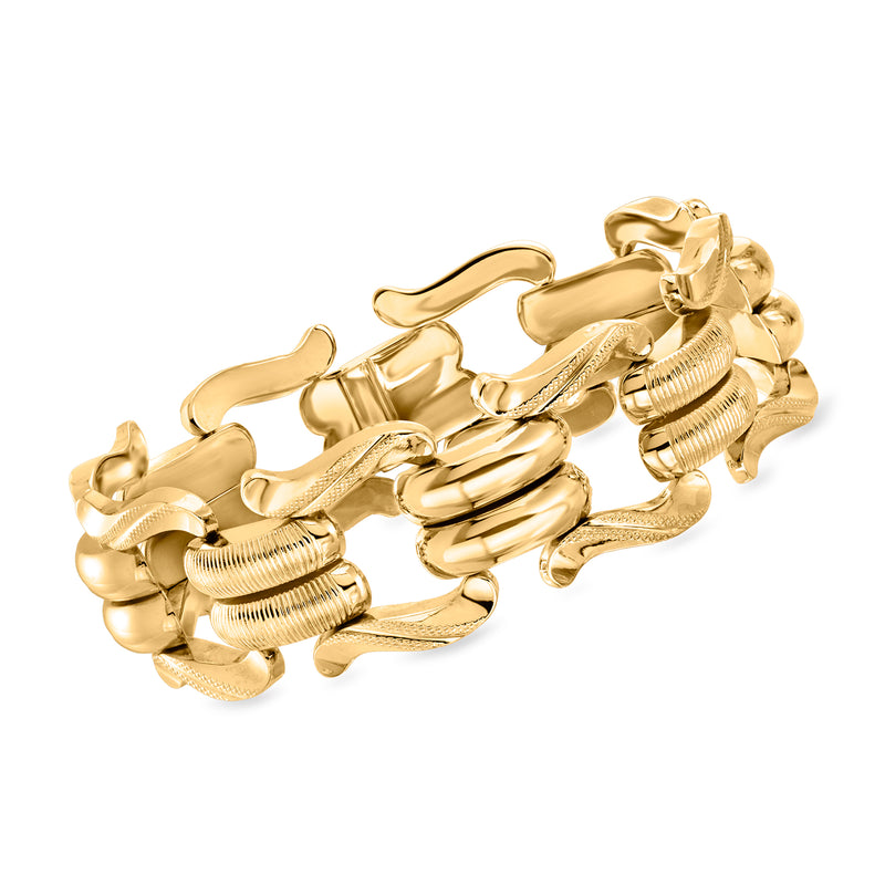 Vintage yellow gold fancy-link bracelet with engraved, ribbed clasp and links