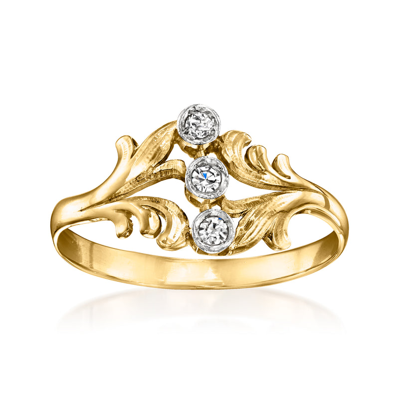 18kt yellow gold three-stone vintage diamond ring with three round white stones