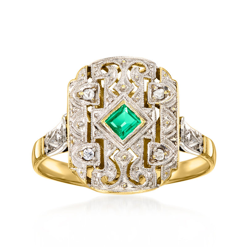 Vintage filigree ring in yellow gold with platinum setting, emerald center and diamond accents