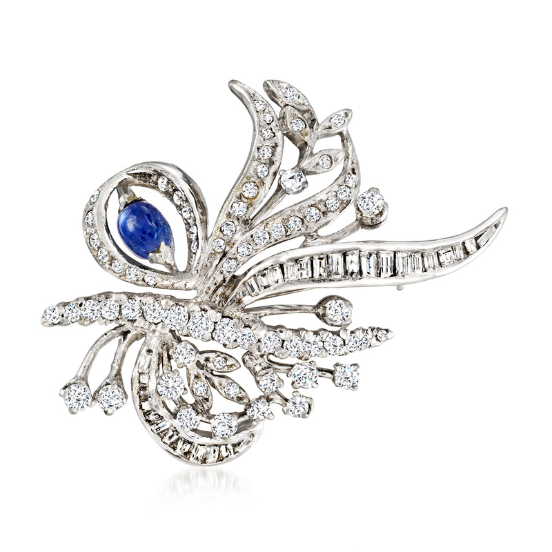 Vintage white gold spray pin with blue sapphire cabochon center and diamond accents
