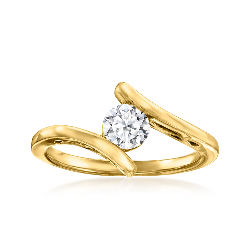 Gold bypass ring with a round lab-grown diamond in a polished open setting