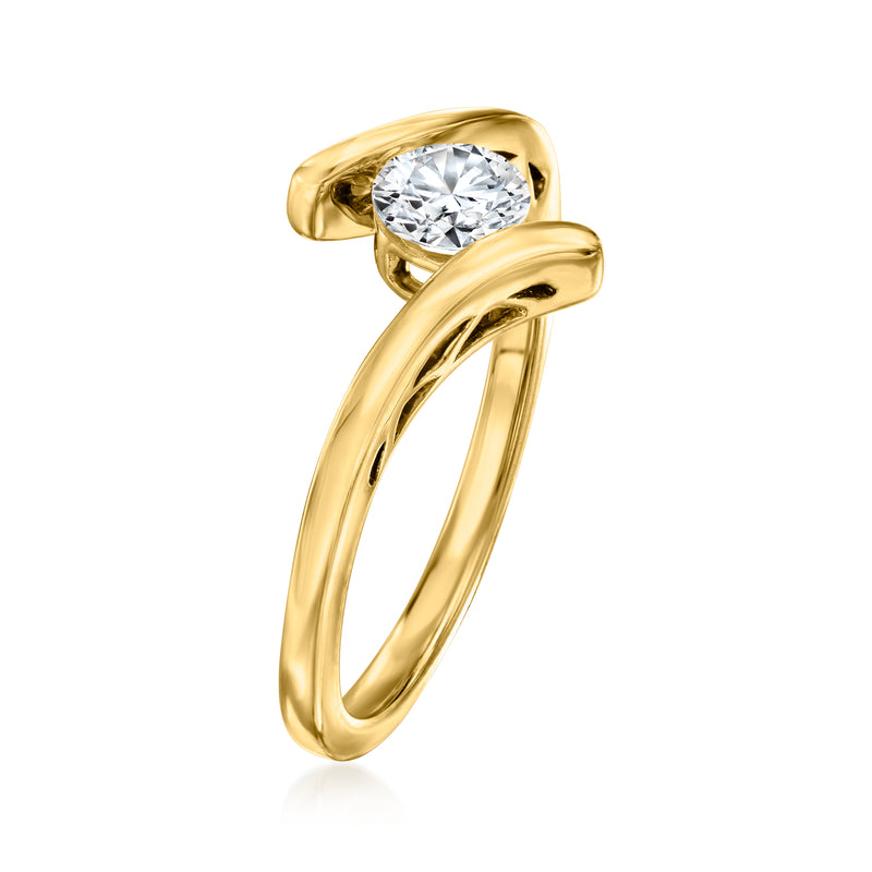 18kt gold over sterling bypass ring featuring a round diamond in an open band