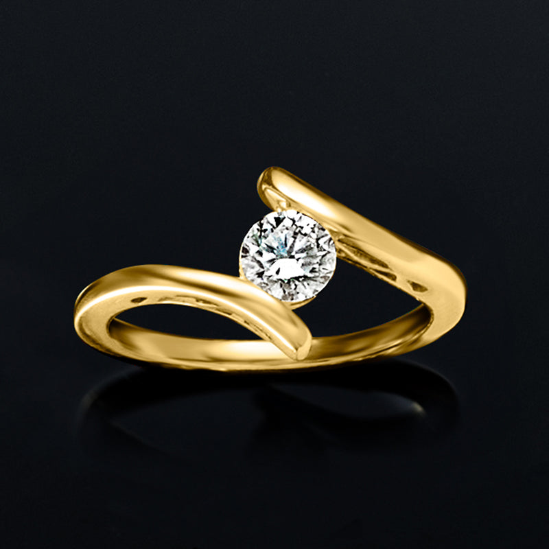 Gold bypass diamond ring with round center stone and curved open V-shaped band
