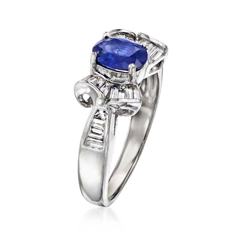 Side view: oval blue sapphire ring with baguette diamond accents in white gold