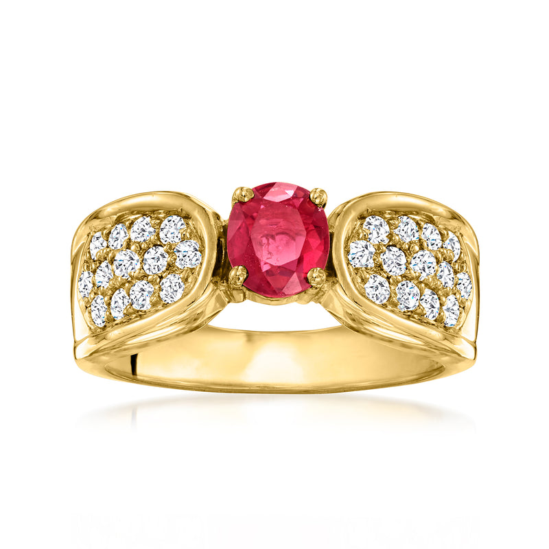 Vintage oval ruby and diamond ring in 18k yellow gold, split-shank with diamond clusters