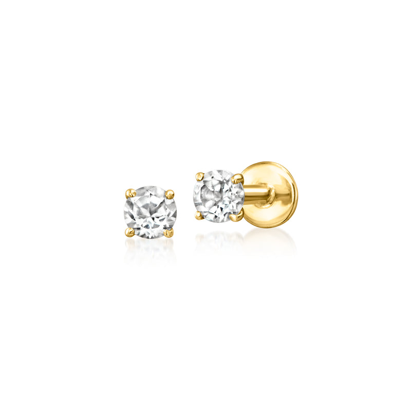 White topaz stud earrings in 14kt yellow gold, flat-back backs visible
