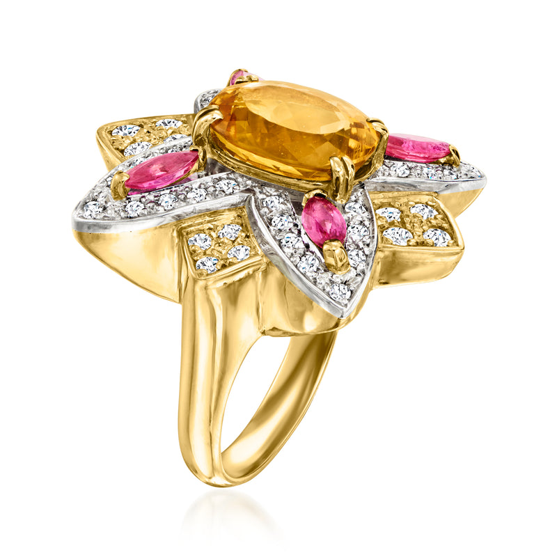 Side view of vintage oval yellow topaz ring with pink rubies and white diamonds, gold band