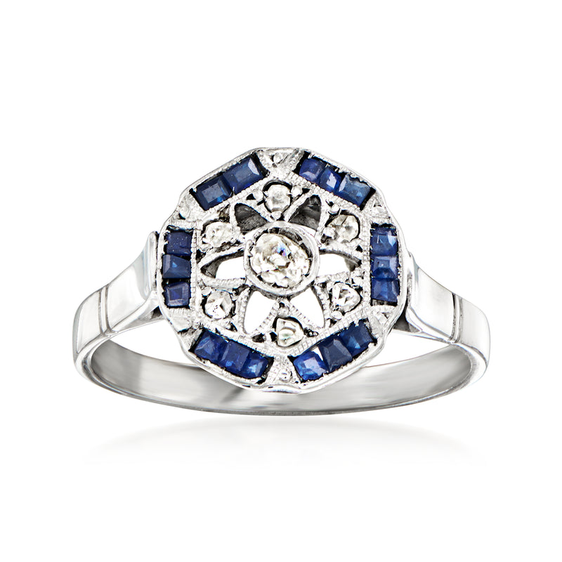 Vintage white gold ring with blue sapphire and round diamonds in openwork cluster