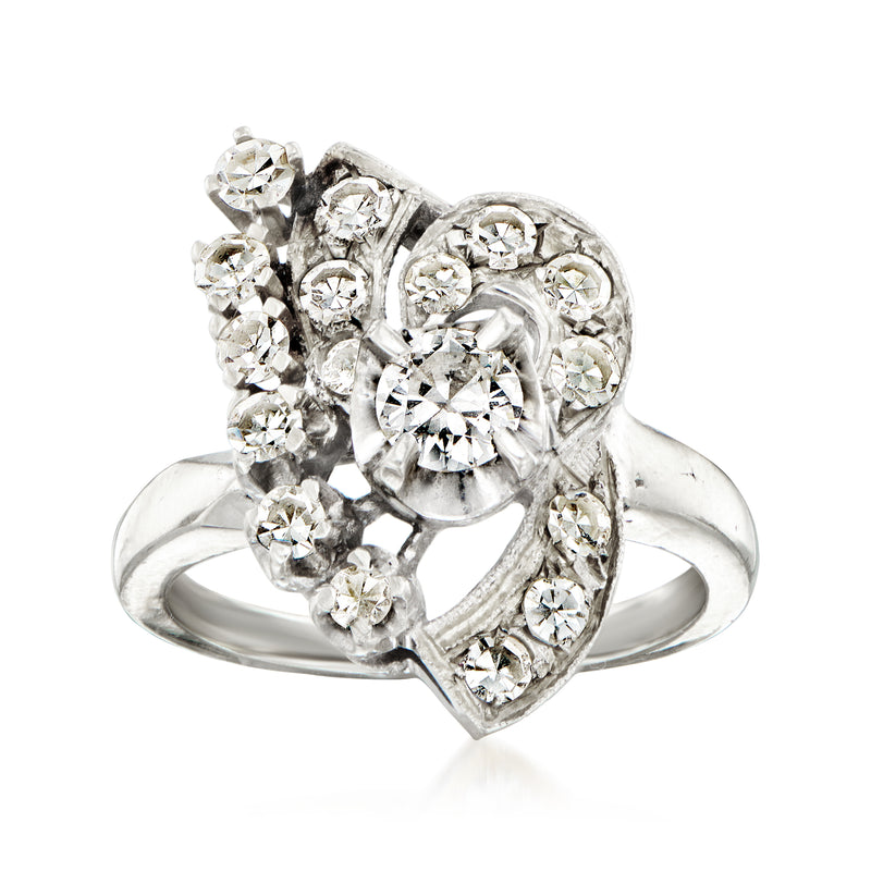 Vintage diamond cluster ring in white gold with multiple round-cut stones