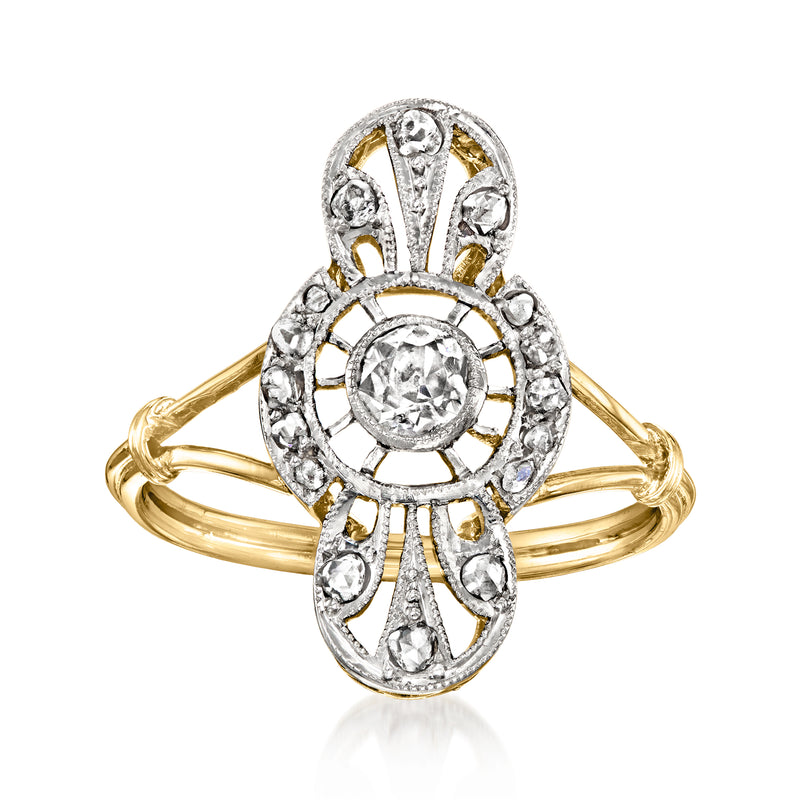 Vintage diamond ring in platinum with yellow gold band and oval halo setting