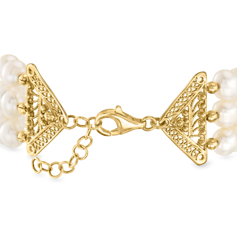 Cultured pearl bracelet with gold-tone triangular filigree end pieces and chain links