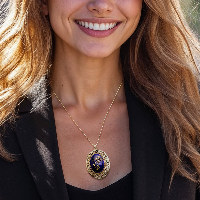 Oval blue enamel flower pendant on gold chain with pearl details, 14kt yellow gold