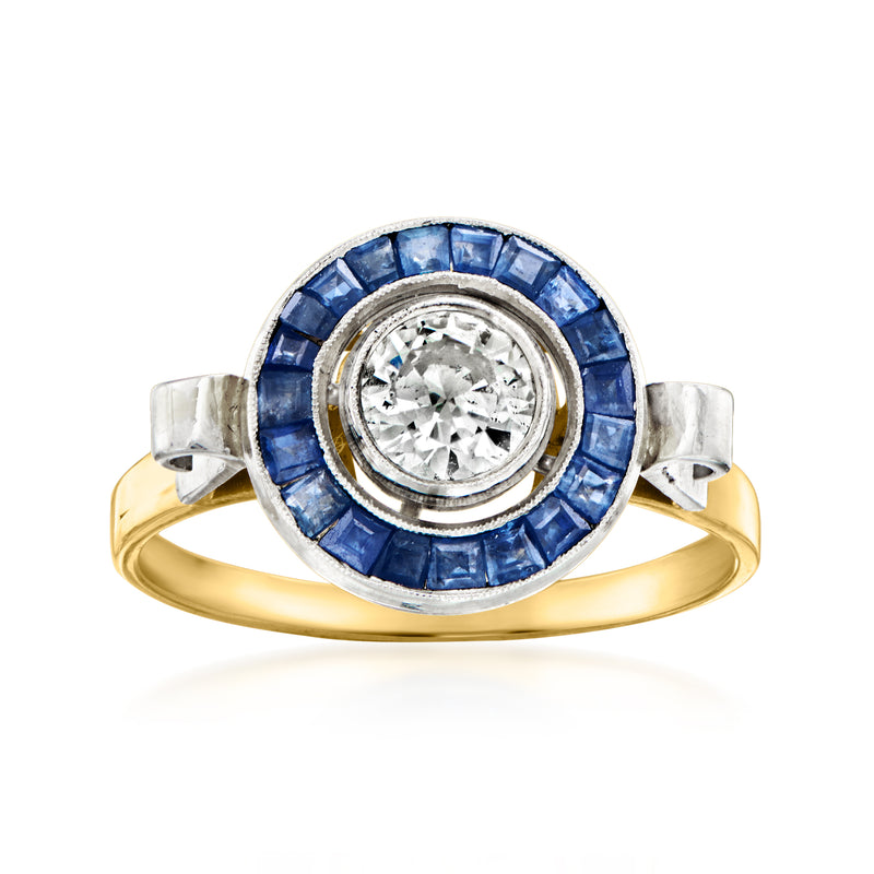 Platinum and 18k yellow gold ring with round diamond center and blue sapphire halo