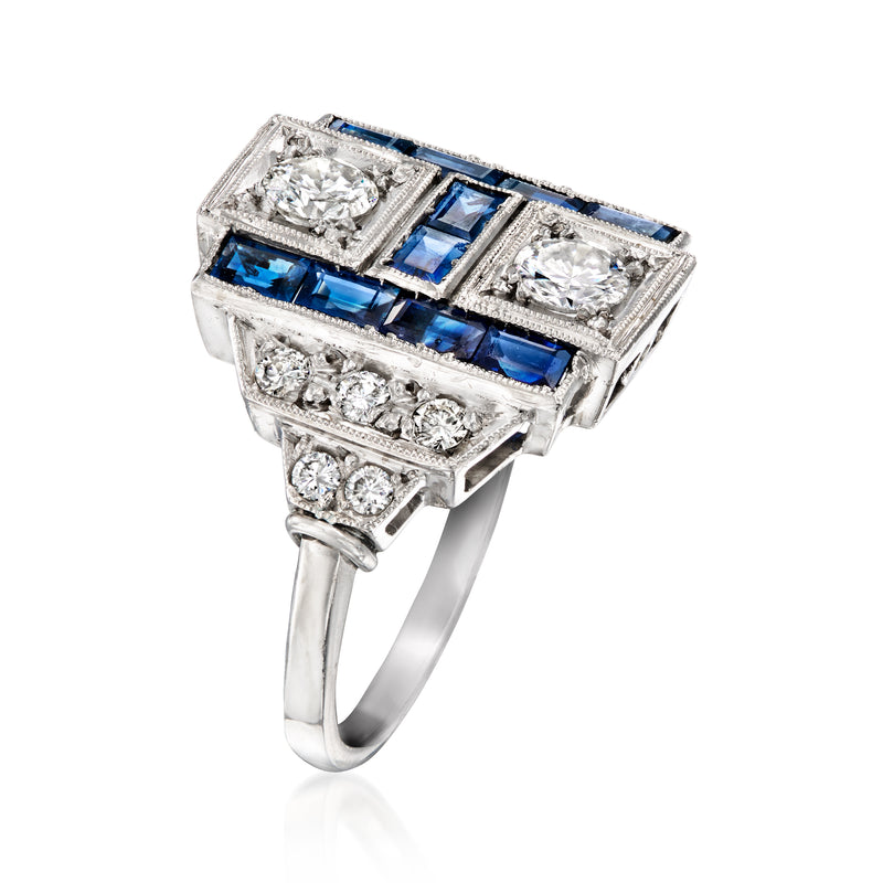 Platinum vintage ring, top view with blue sapphire baguettes and diamond clusters