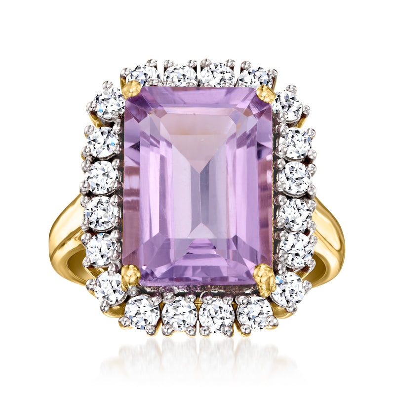 Amethyst cushion-cut ring in gold with diamond halo and round side stones
