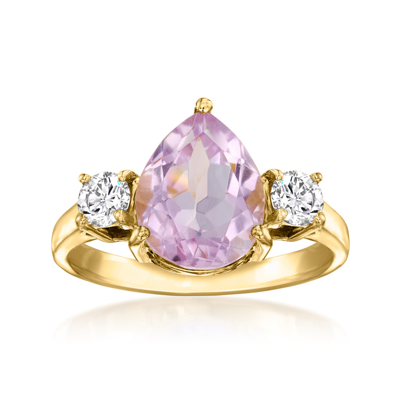 Gold amethyst ring with pear-cut lavender center stone and two round diamond accents