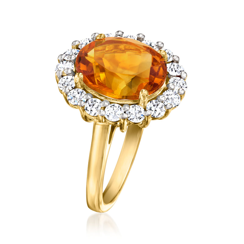 18k gold over sterling ring with oval orange citrine and sparkling round diamond halo