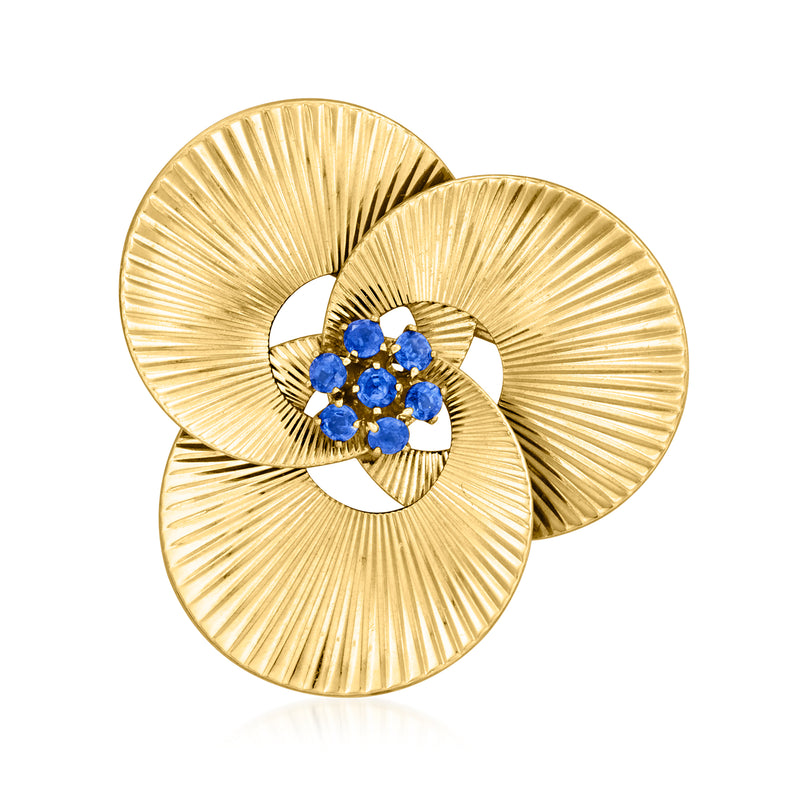 14kt yellow gold triple-circle pin with blue sapphire cluster in center