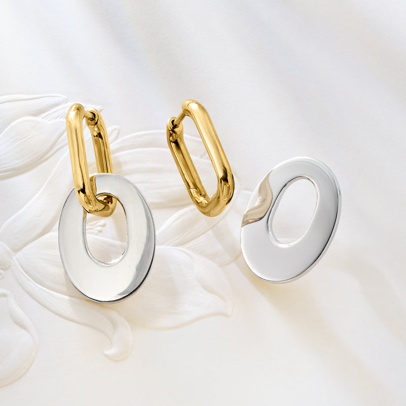 Hoop earrings with gold top loops and oval sterling silver drop pendants