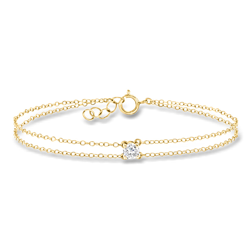 14kt yellow gold two-strand diamond bracelet with round center stone and clasp