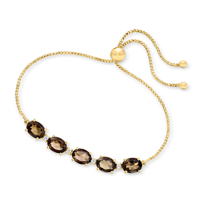 Gold bolo bracelet with dark smoky quartz oval row and round ball tips