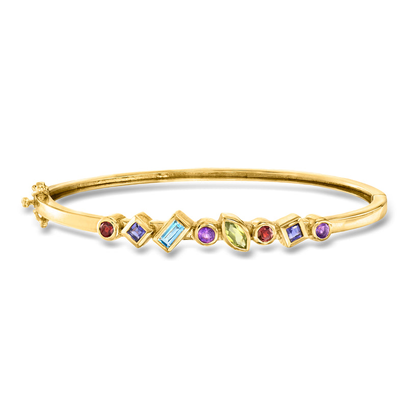 Gold bangle bracelet with multi-color zigzag gemstone settings