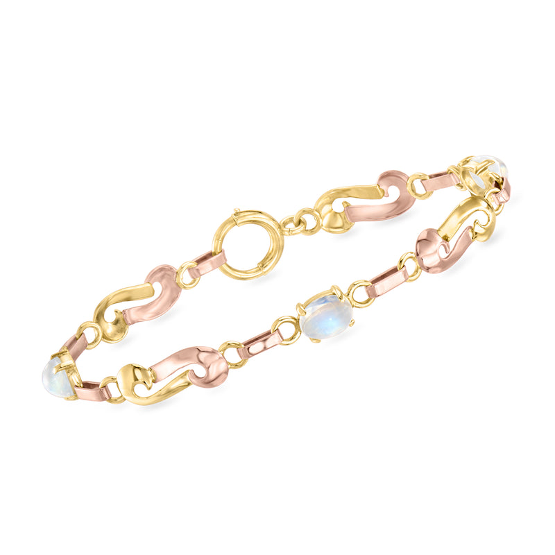Two-tone 14kt gold vintage bracelet with moonstone stations and linked pink-gold details
