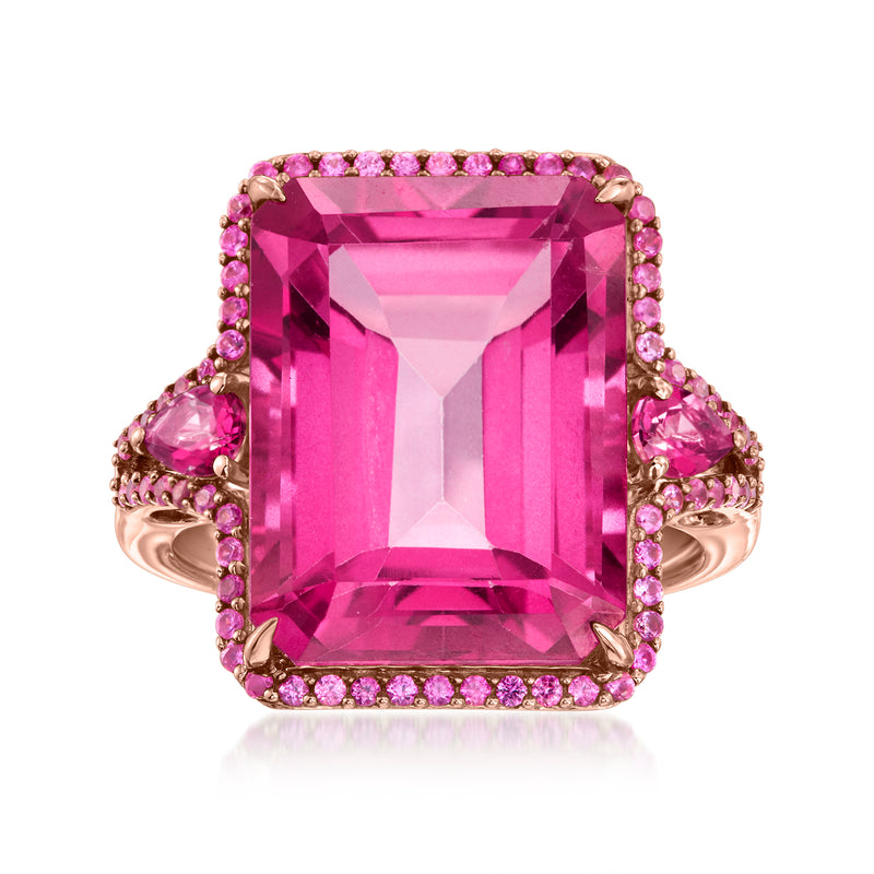 Rose gold ring with large emerald-cut pink topaz center and pink sapphire halo