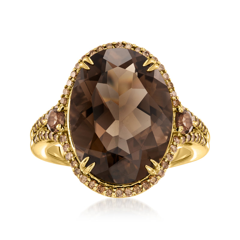 14kt yellow gold ring with oval smoky quartz center and brown diamond halo