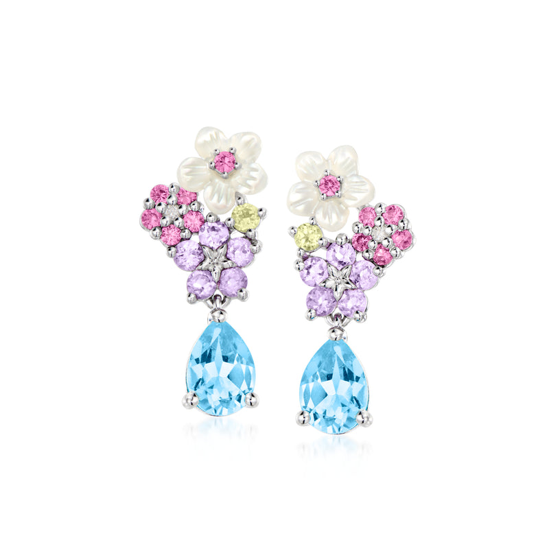 Floral drop earrings with silver petals, pink and purple stones, and blue teardrop gems