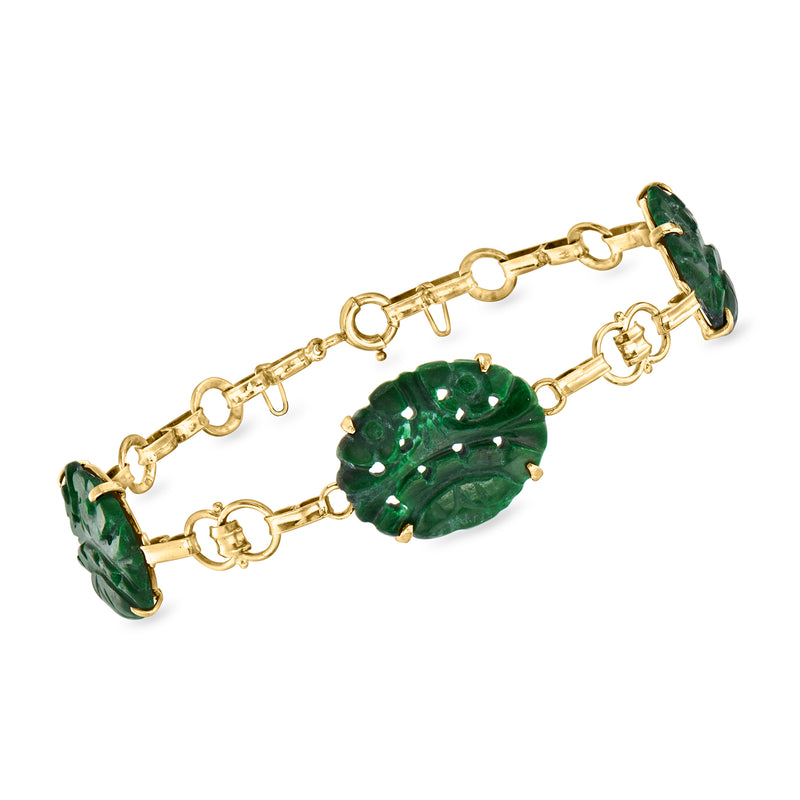 14kt yellow gold bracelet with green carved nephrite station links and clasp