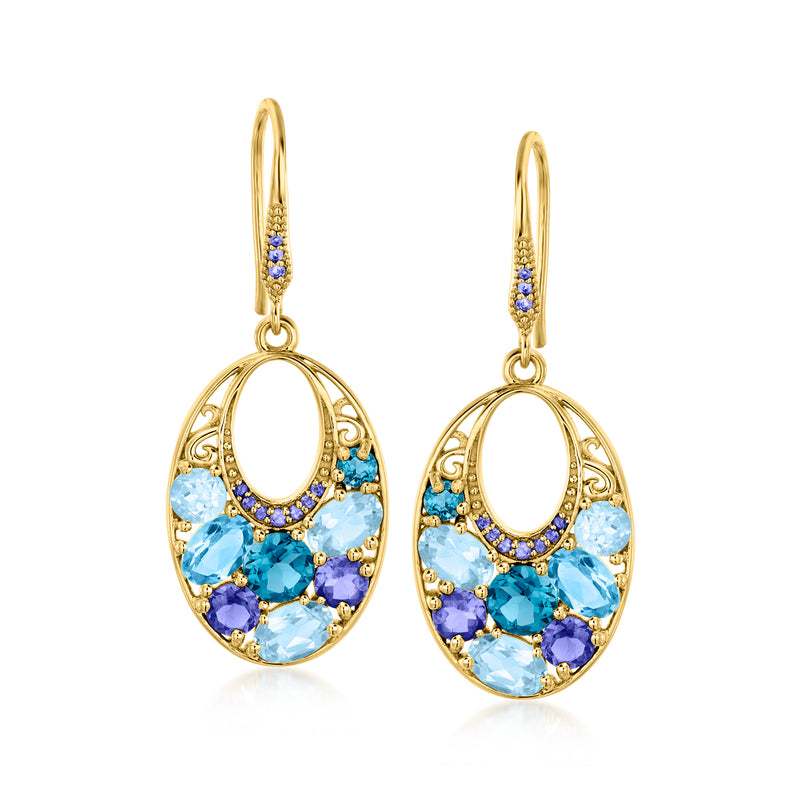 Gold over sterling drop earrings with oval blue gemstones and small purple accents, hoop earwire