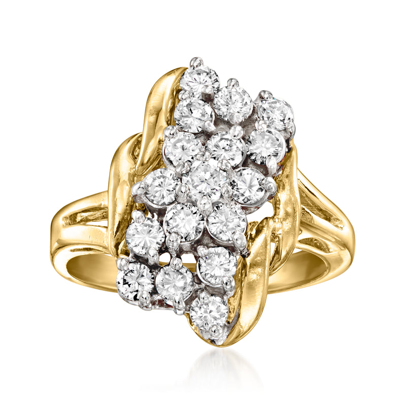 Vintage cluster diamond ring in 14kt yellow gold with oval and round stones
