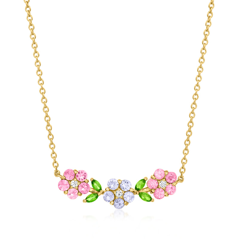 Gold-tone chain necklace with pink and light-blue gemstone flowers, green leaf accents