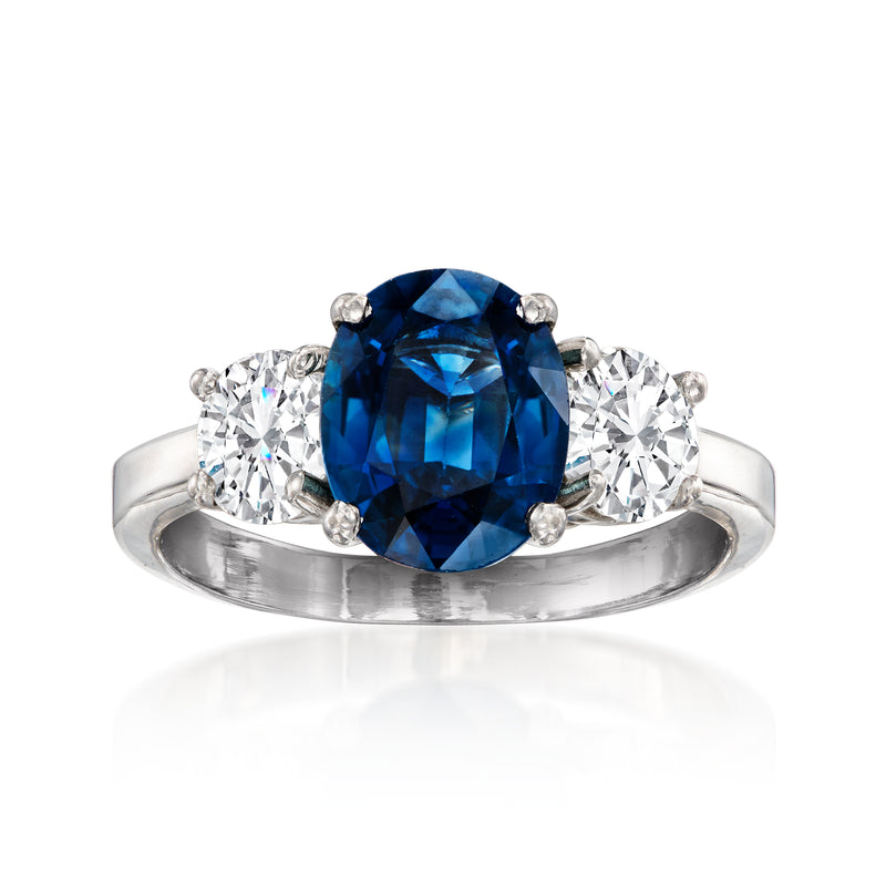 Vintage 14k white gold ring with blue sapphire and side diamonds, three-stone look