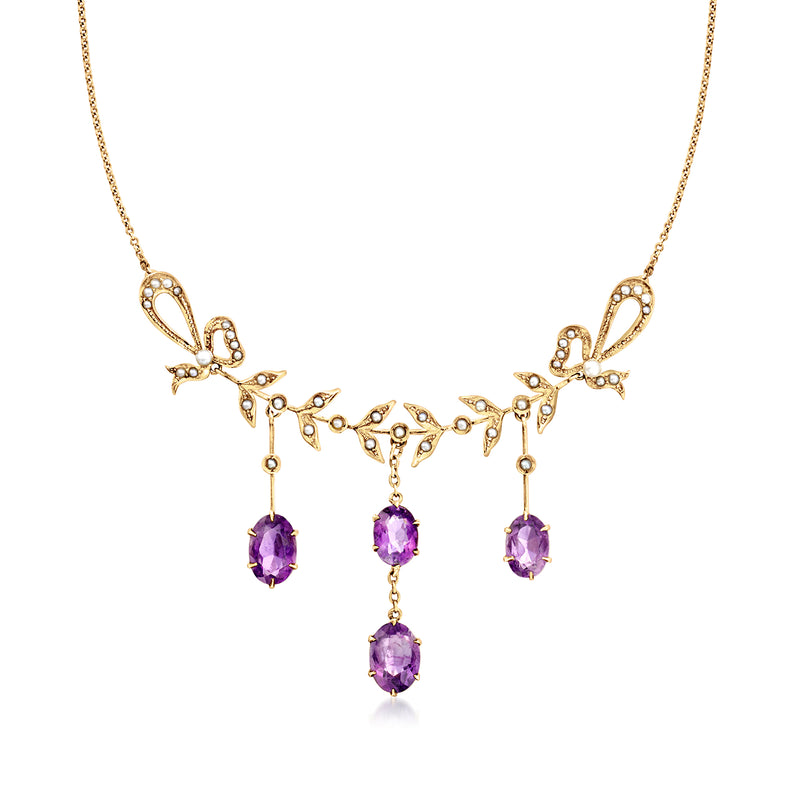 Vintage amethyst drop necklace in yellow gold with four purple gemstone drops.
