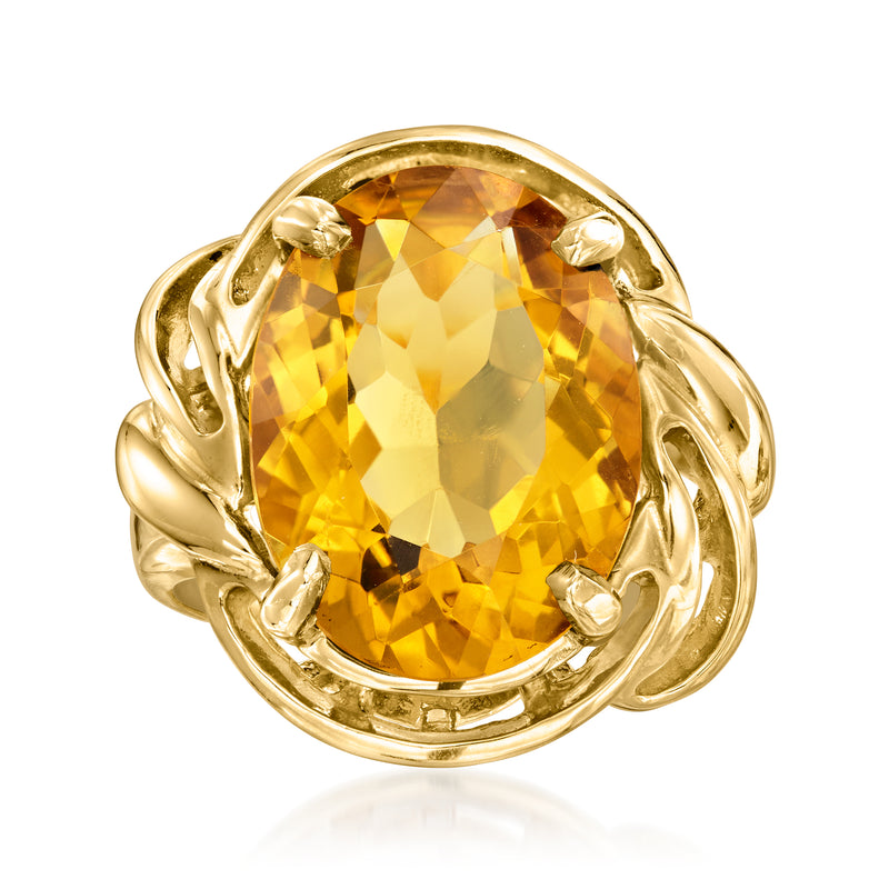 Vintage citrine cocktail ring in yellow gold, oval gemstone with claw prongs