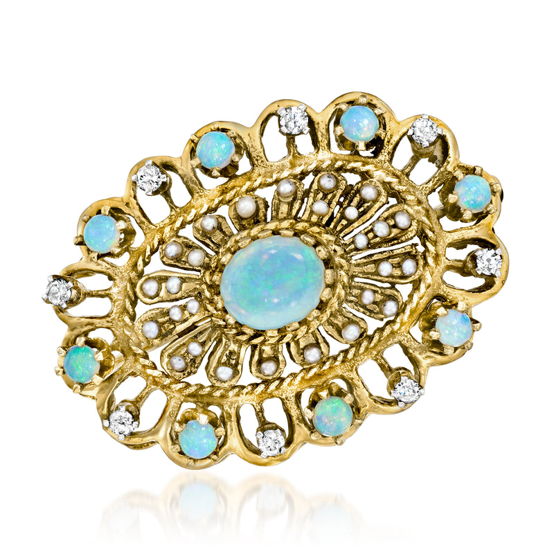 Vintage yellow gold filigree pin with opal center, blue stones, diamonds and pearls