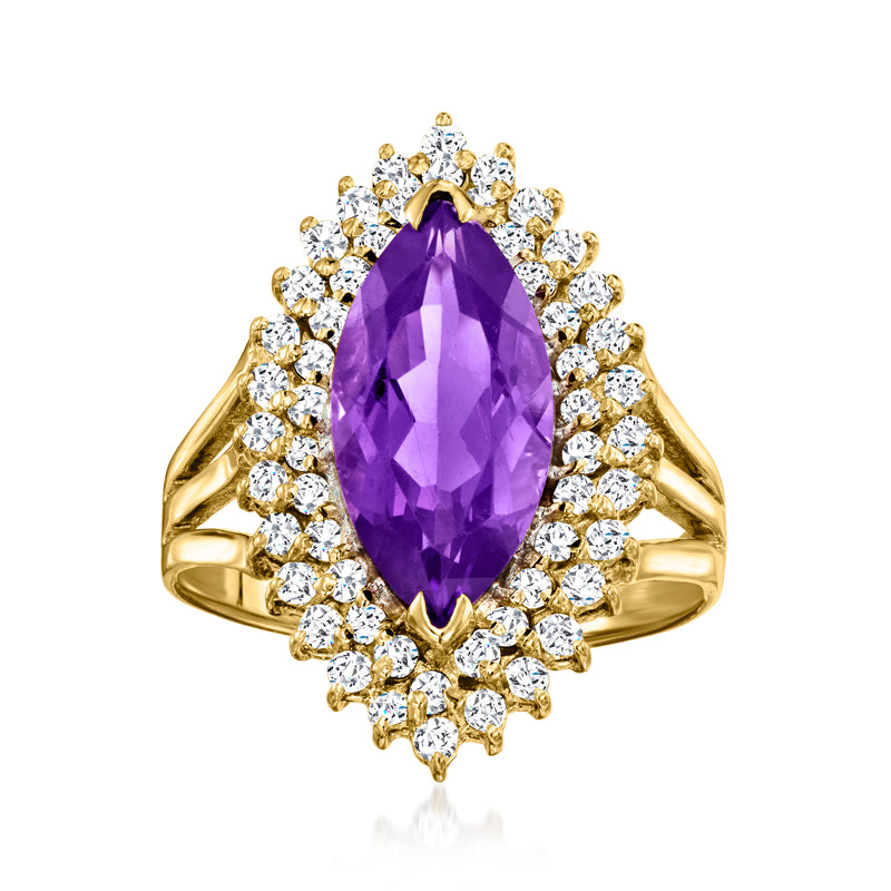 Amethyst and diamond ring in 14kt yellow gold with marquise purple center