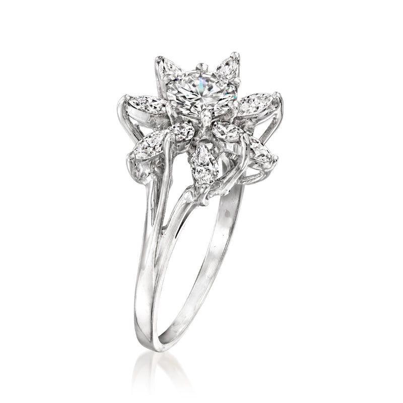 14kt white gold diamond flower ring with raised center stone and split, curved band