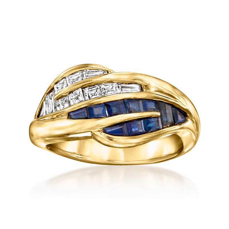 18kt yellow gold ring with oval blue sapphire center and baguette diamond accents