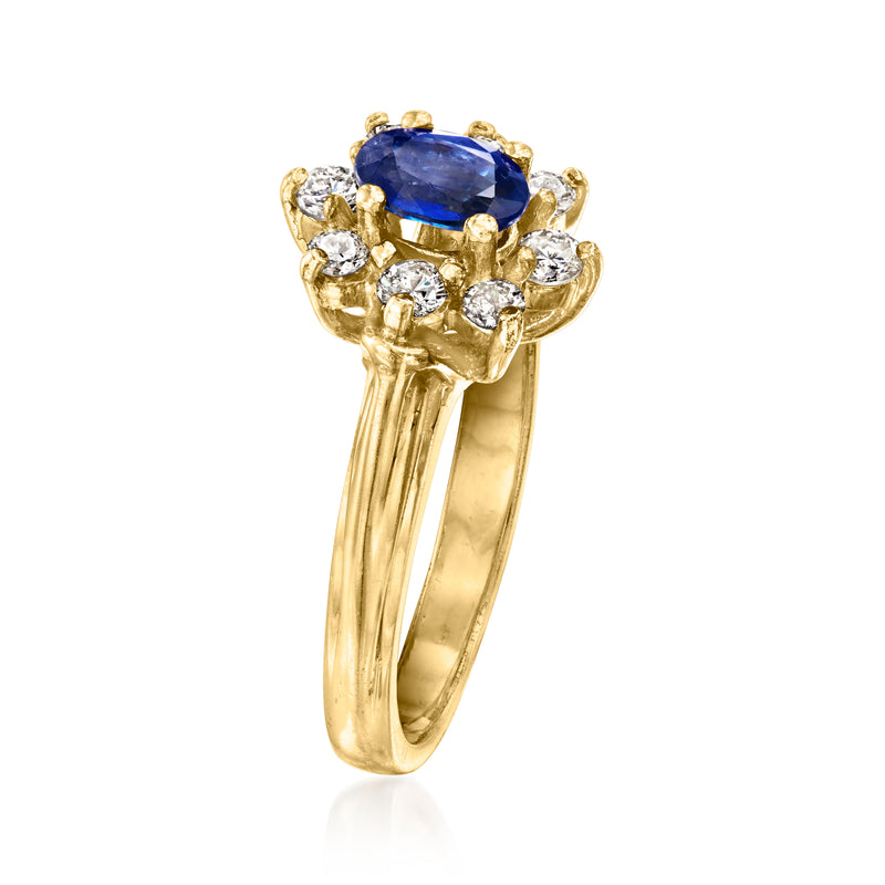 Vintage 14kt yellow gold ring with blue sapphire center and diamond cluster