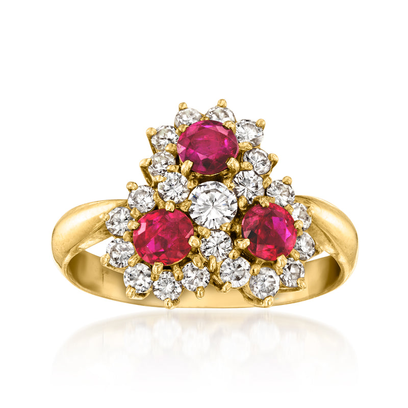 18kt yellow gold cluster ring with oval rubies and round diamonds, floral setting