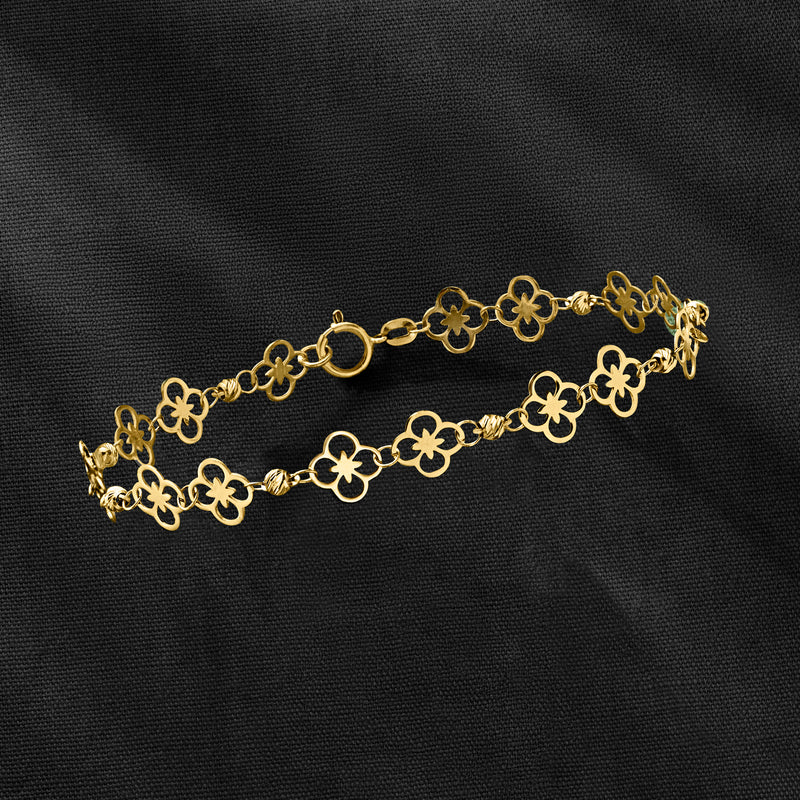 10kt yellow gold floral link bracelet with clover charms and round clasp
