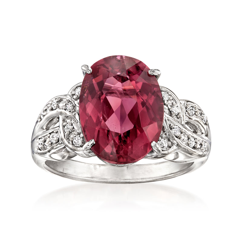 Vintage pink tourmaline oval ring in 18kt white gold with diamond side accents