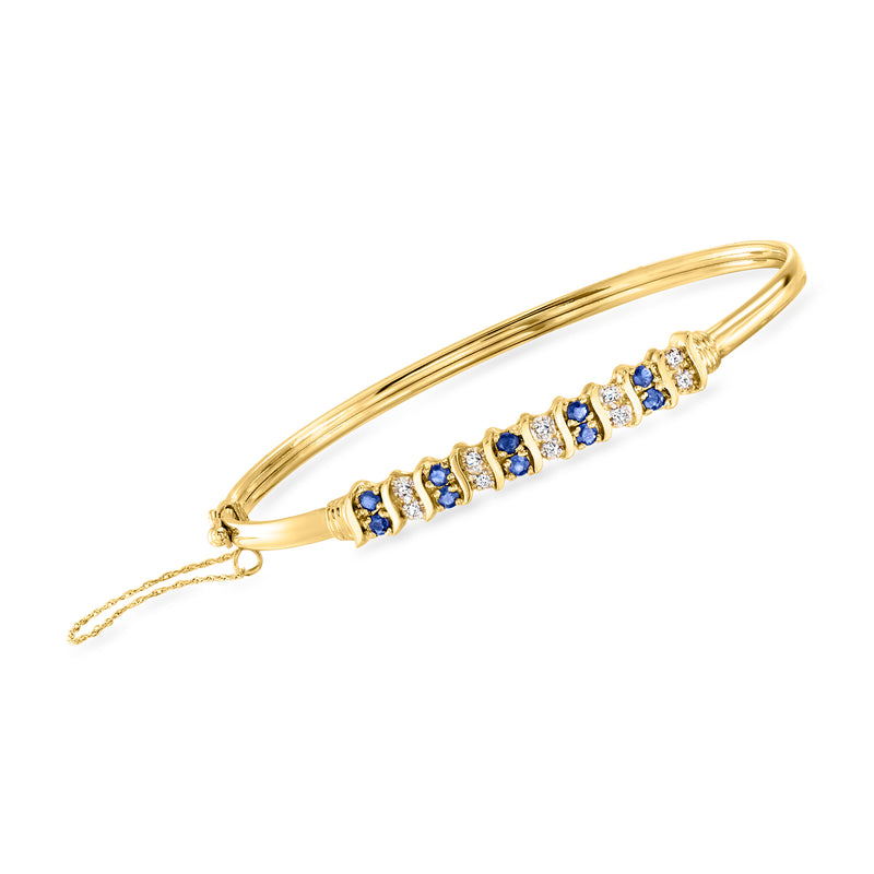 Vintage 14kt yellow gold bangle bracelet with sapphire and diamond row